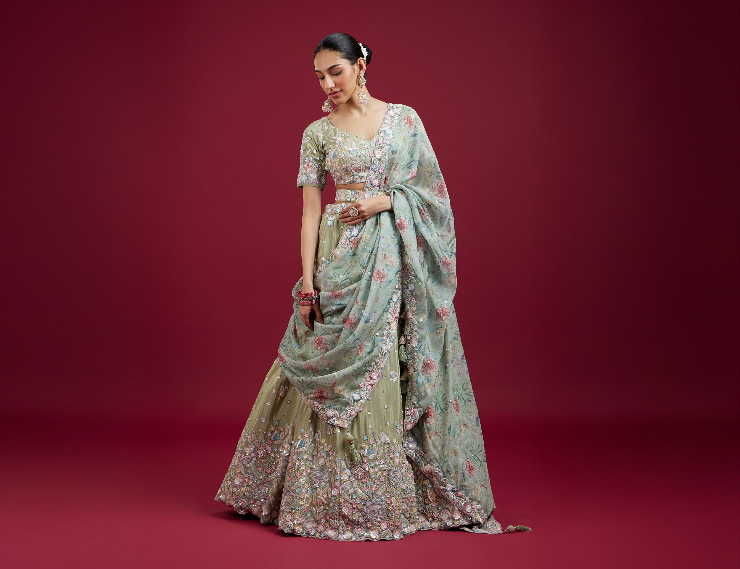 Women flaunting beautiful designer pastel lehenga for wedding